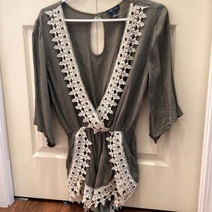 Cute little jumper/bathing suit cover up.